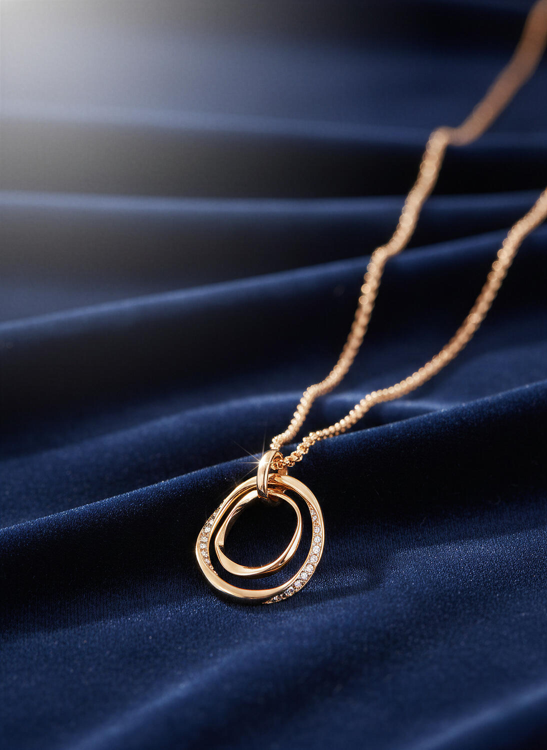 Close-up jewelry imagery focused on material quality, texture, and light.